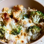 A portion of chicken broccoli Alfredo casserole served in a bowl