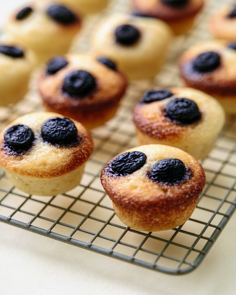 Puffed and golden baked pancake bites cooling on a wire rack
