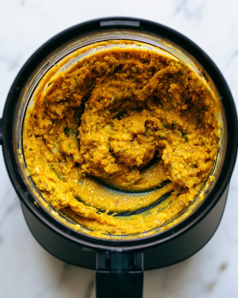 Fresh yellow turmeric and ginger paste blended in a food processor