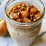 Apple Pie Overnight Oats with Jammy Maple Apples Creamy apple pie overnight oats in a glass jar topped with shiny diced apples and crunchy pecans